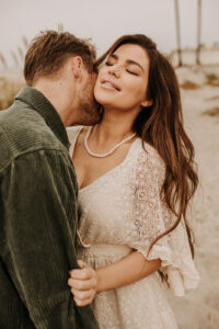 warm family beach photo shoot couples session on beach golden glow morning San Diego beach photographer