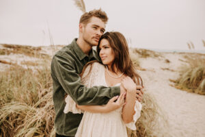 warm family beach photo shoot couples session on beach golden glow morning San Diego beach photographer