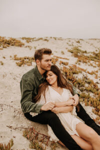 warm family beach photo shoot couples session on beach golden glow morning San Diego beach photographer