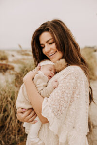 warm family beach photo shoot couples session on beach golden glow morning San Diego beach photographer