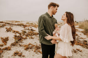 warm family beach photo shoot couples session on beach golden glow morning San Diego beach photographer