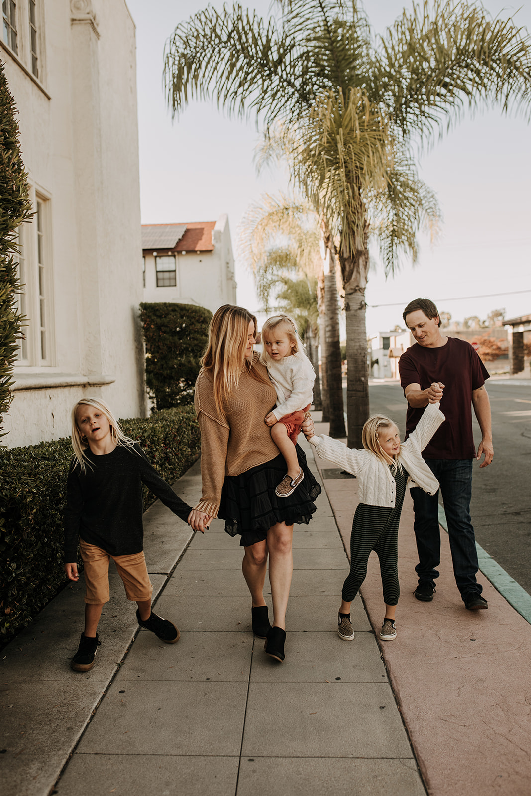 warm family city urban photoshoot family photo inspiration San Diego family photographer Sabrina Kinsella