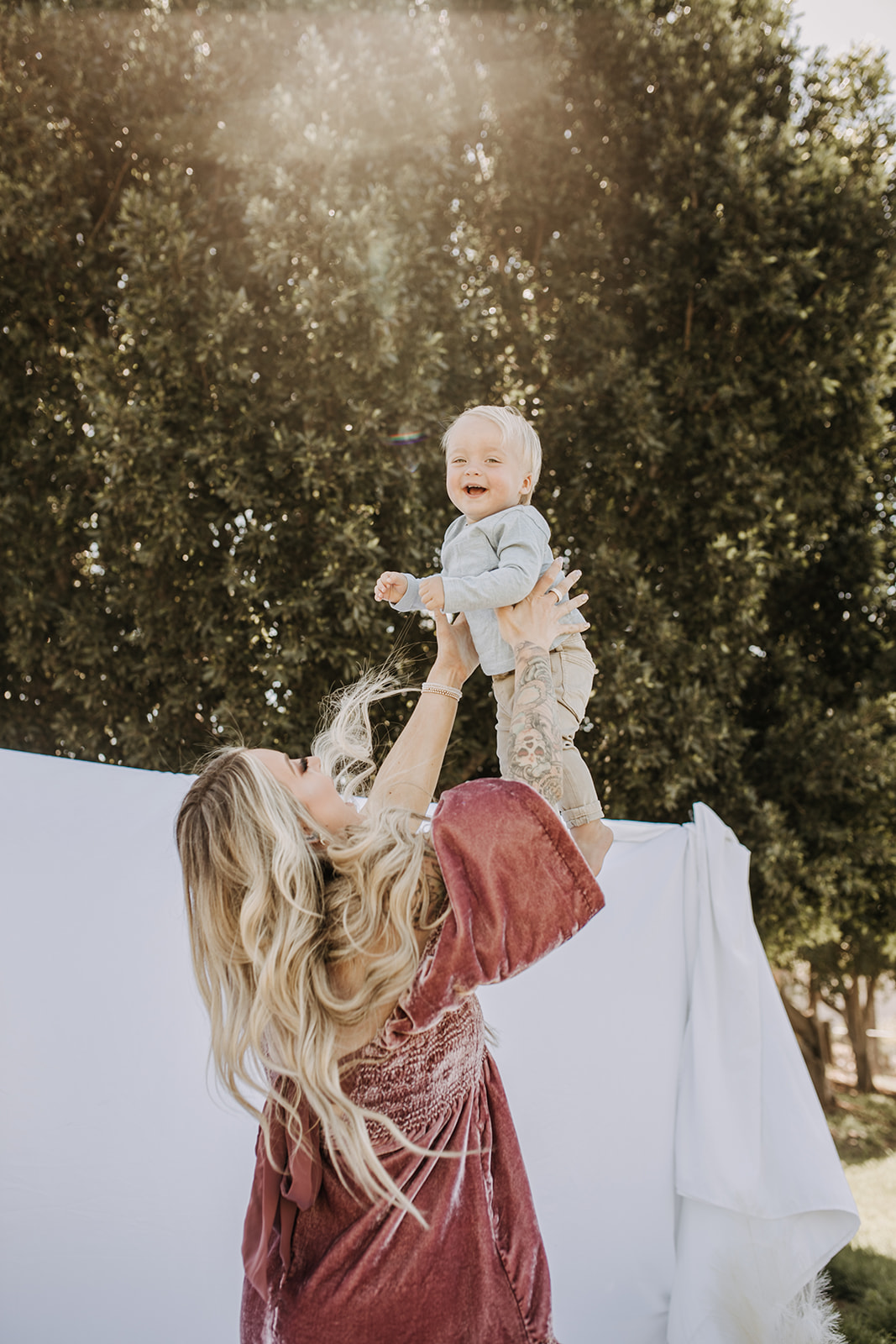 backyard mini mama and me motherhood photos candid motherhood candid family photos family photos San Diego family photographer outdoor family session 