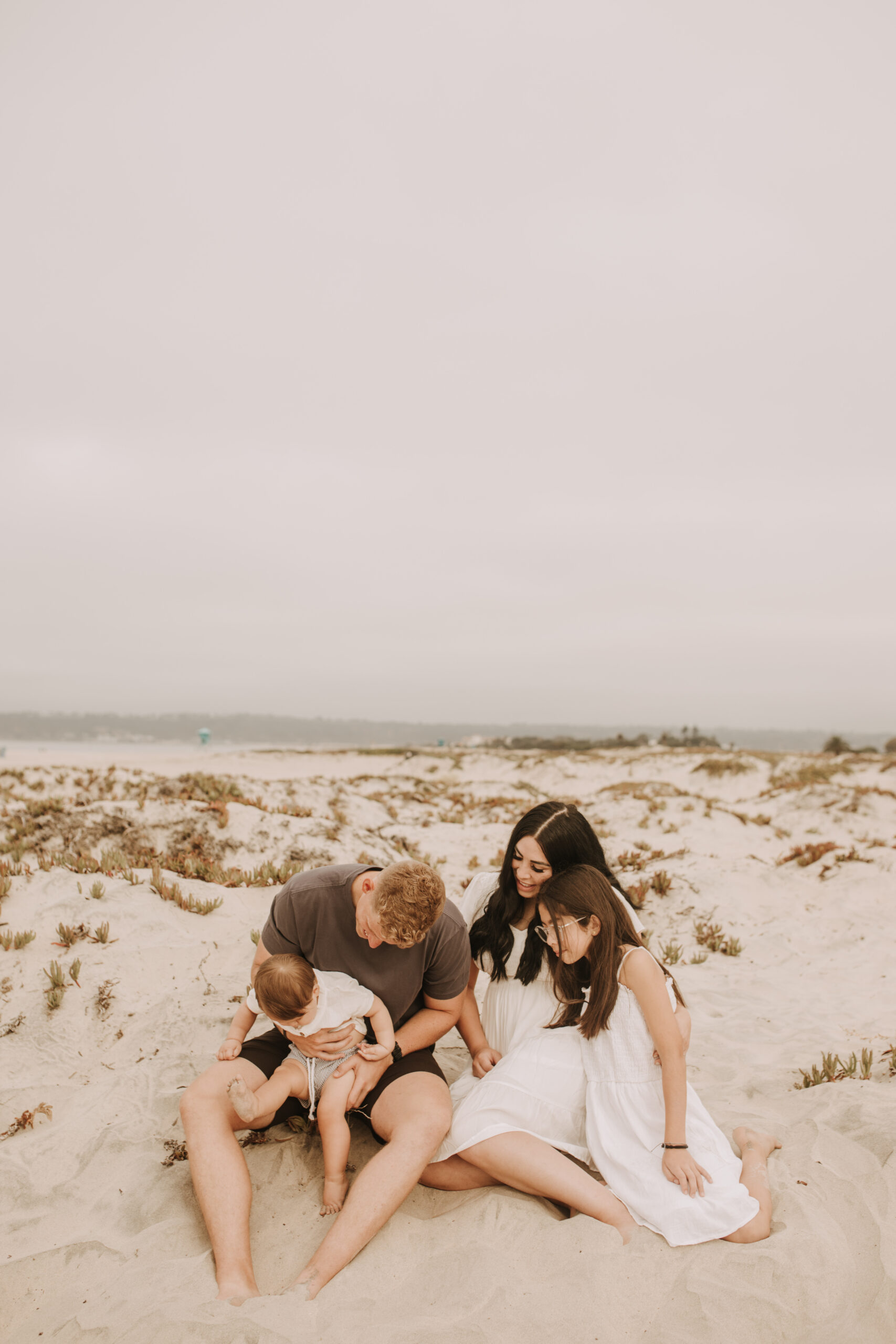 outdoor loony moody neutral's cream colored beach family photos San Diego family photographer Sabrina Kinsella candid family photos