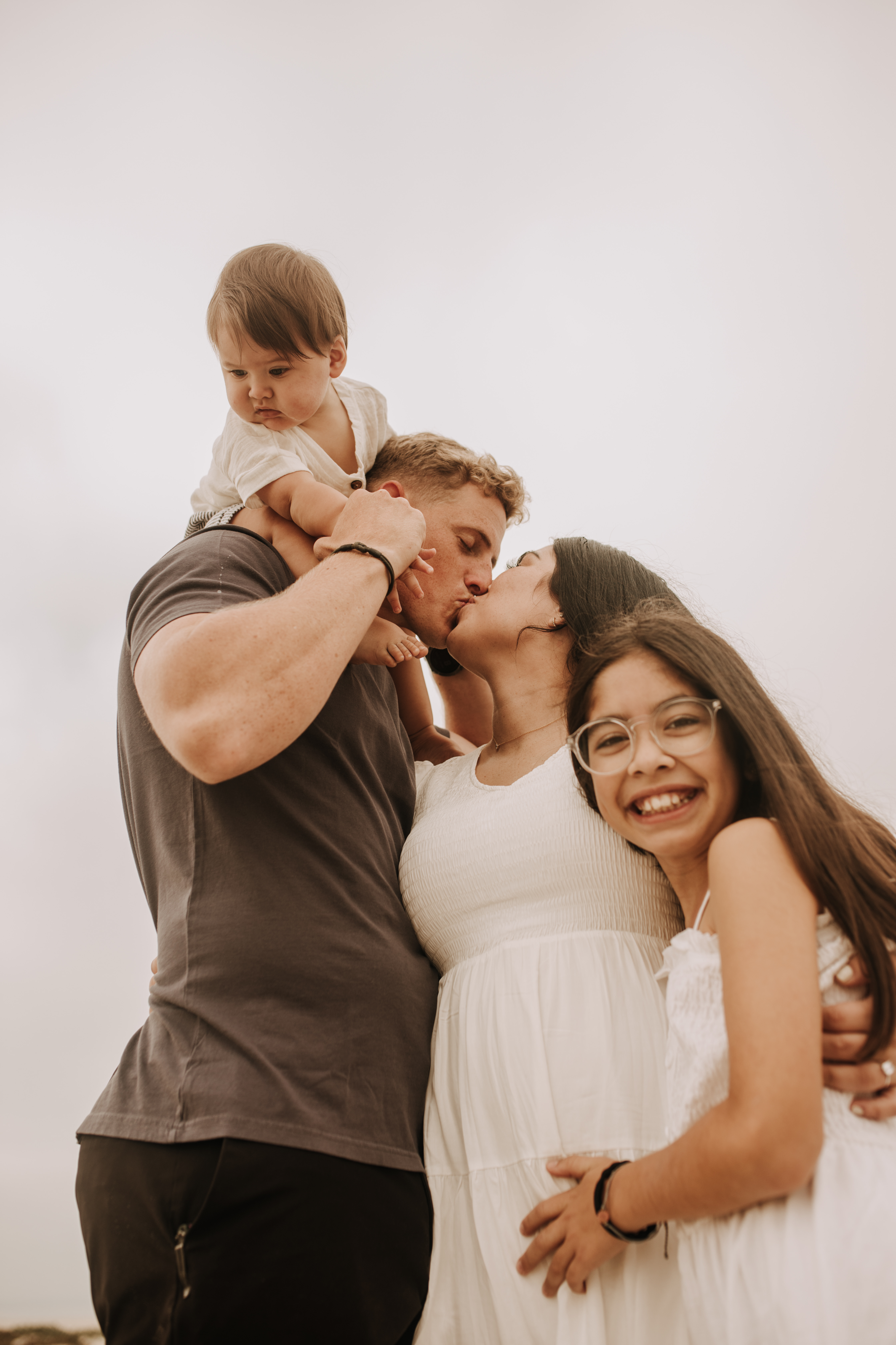 outdoor loony moody neutral's cream colored beach family photos San Diego family photographer Sabrina Kinsella candid family photos