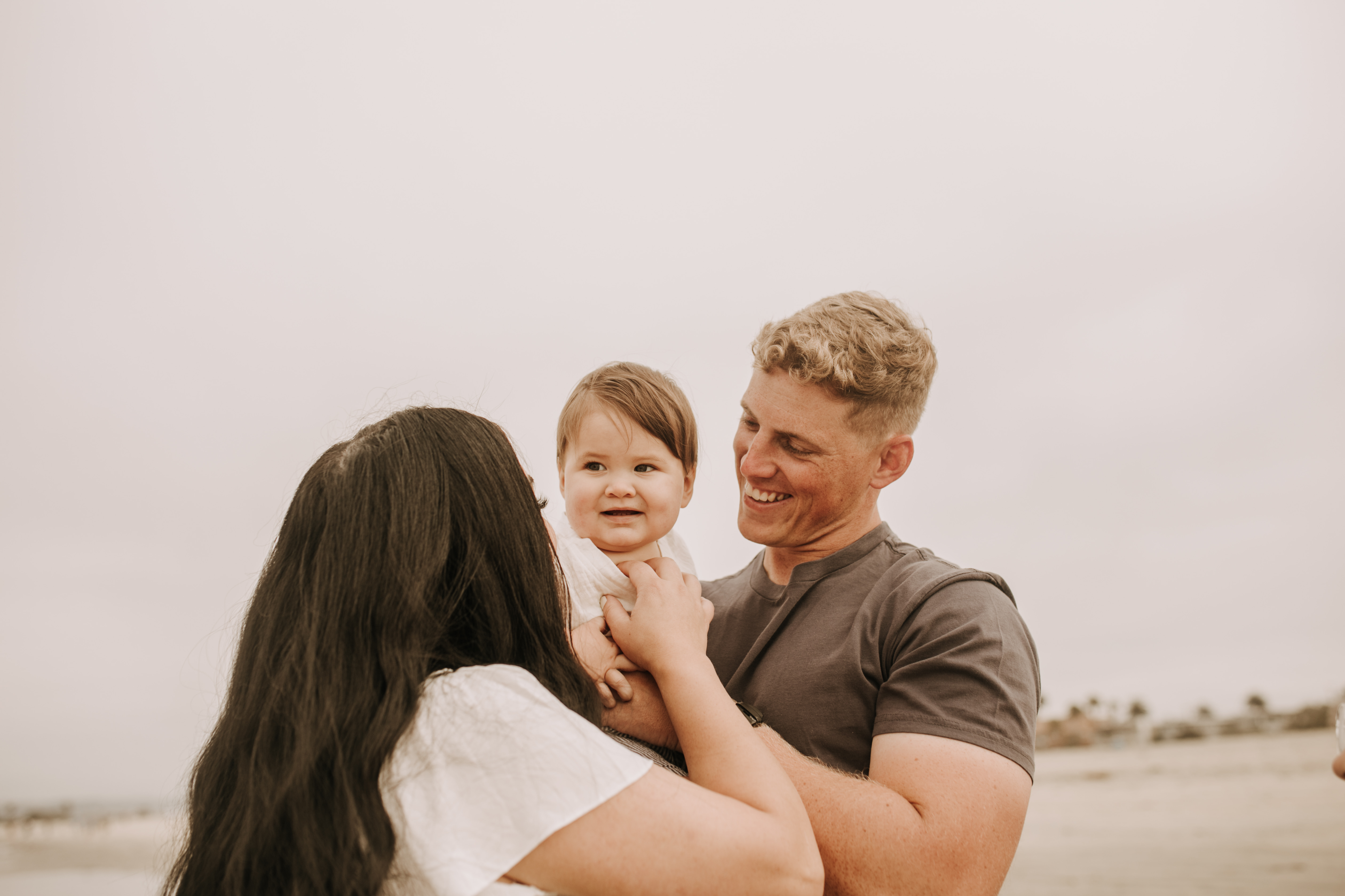 outdoor loony moody neutral's cream colored beach family photos San Diego family photographer Sabrina Kinsella candid family photos