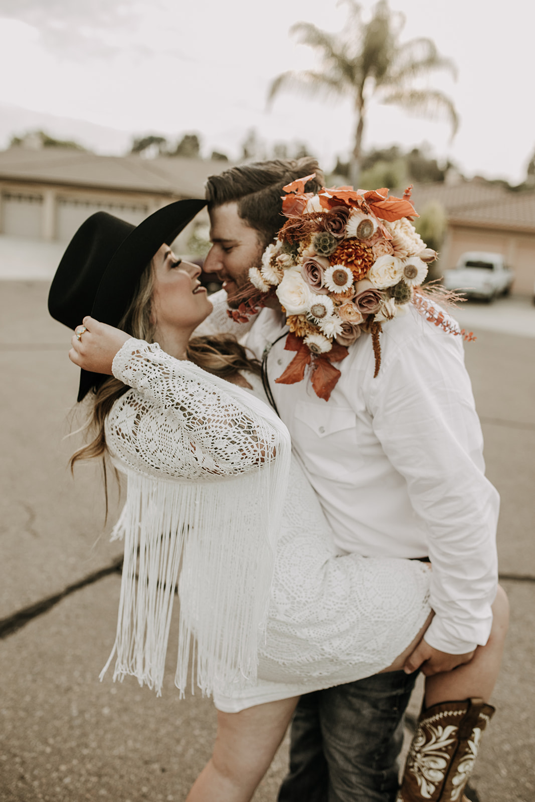 outdoor wedding backyard wedding wedding dress wedding florals western wedding rustic wedding small intimate backyard wedding bride and groom marriage just married wedding party wedding reception photos wedding photography wedding photographer San Diego wedding photographer sabrina kinsella 