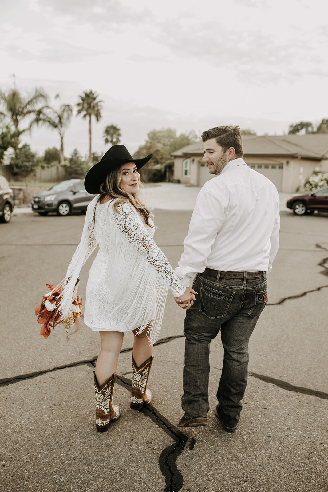 outdoor wedding backyard wedding wedding dress wedding florals western wedding rustic wedding small intimate backyard wedding bride and groom marriage just married wedding party wedding reception photos wedding photography wedding photographer San Diego wedding photographer sabrina kinsella