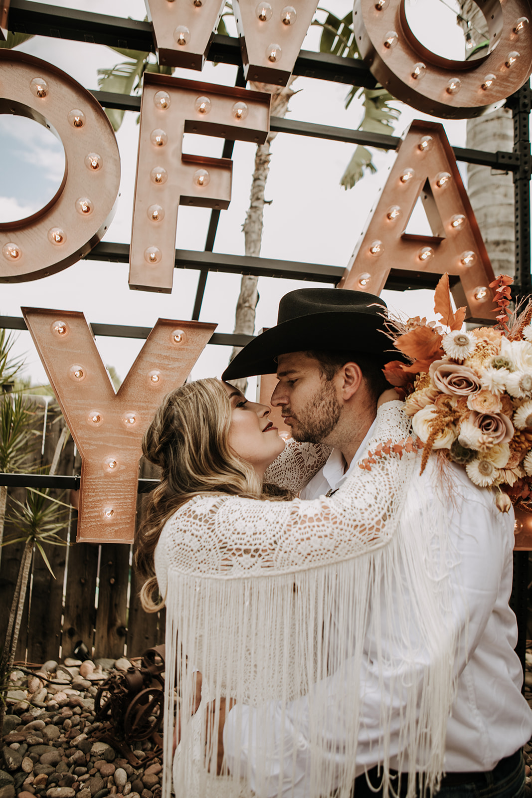 outdoor wedding backyard wedding wedding dress wedding florals western wedding rustic wedding small intimate backyard wedding bride and groom marriage just married wedding party wedding reception photos wedding photography wedding photographer San Diego wedding photographer sabrina kinsella