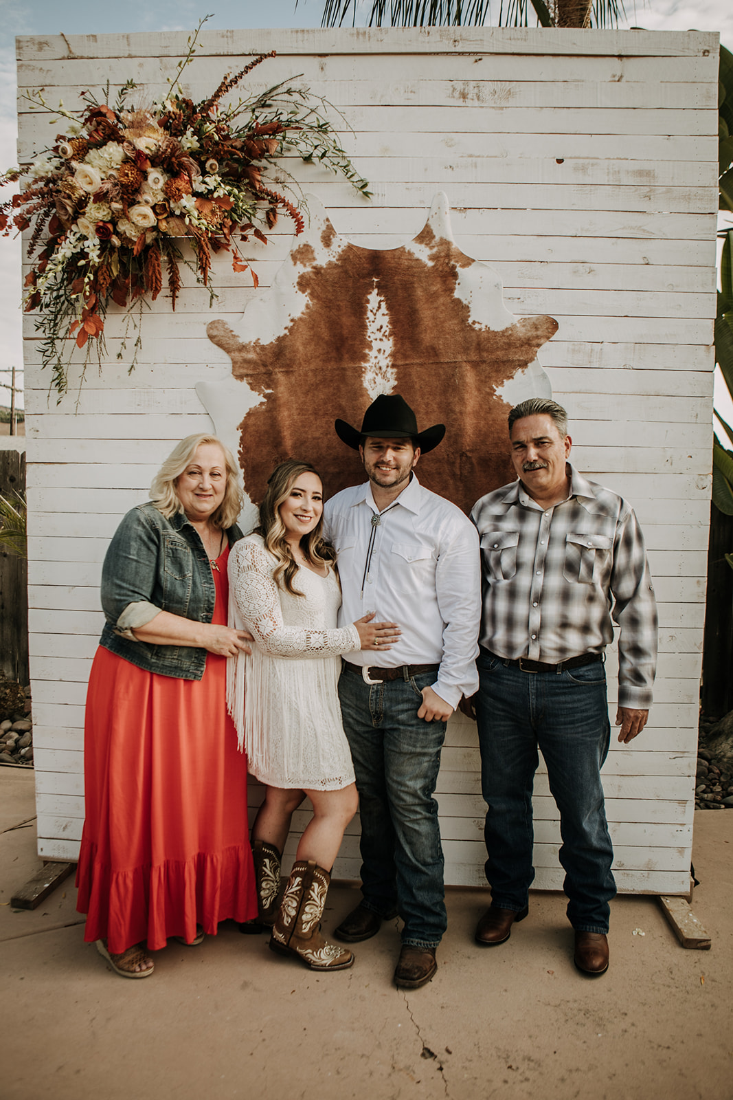 outdoor wedding backyard wedding wedding dress wedding florals western wedding rustic wedding small intimate backyard wedding bride and groom marriage just married wedding party wedding reception photos wedding photography wedding photographer San Diego wedding photographer sabrina kinsella