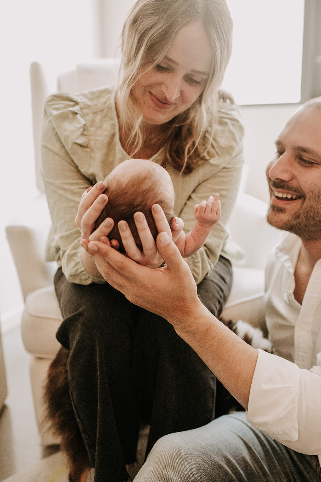 in home newborn photos newborn baby infant family photos in home family session San Diego family photographer Sabrina Kinsella