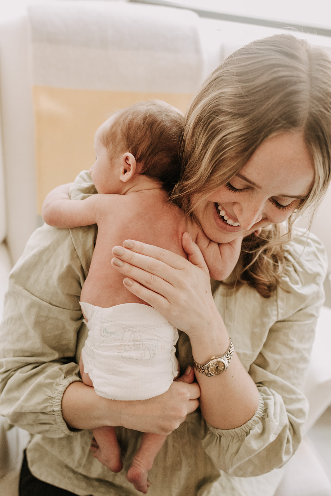 in home newborn photos newborn baby infant family photos in home family session San Diego family photographer Sabrina Kinsella