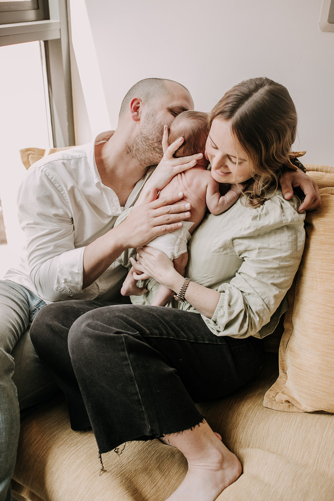 in home newborn photos newborn baby infant family photos in home family session San Diego family photographer Sabrina Kinsella