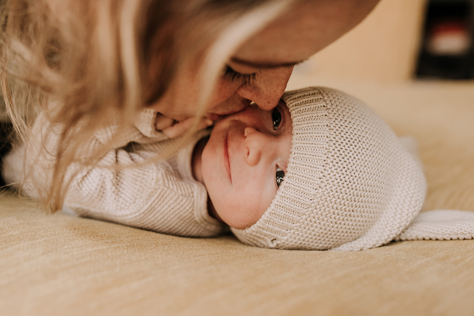 in home newborn photos newborn baby infant family photos in home family session San Diego family photographer Sabrina Kinsella