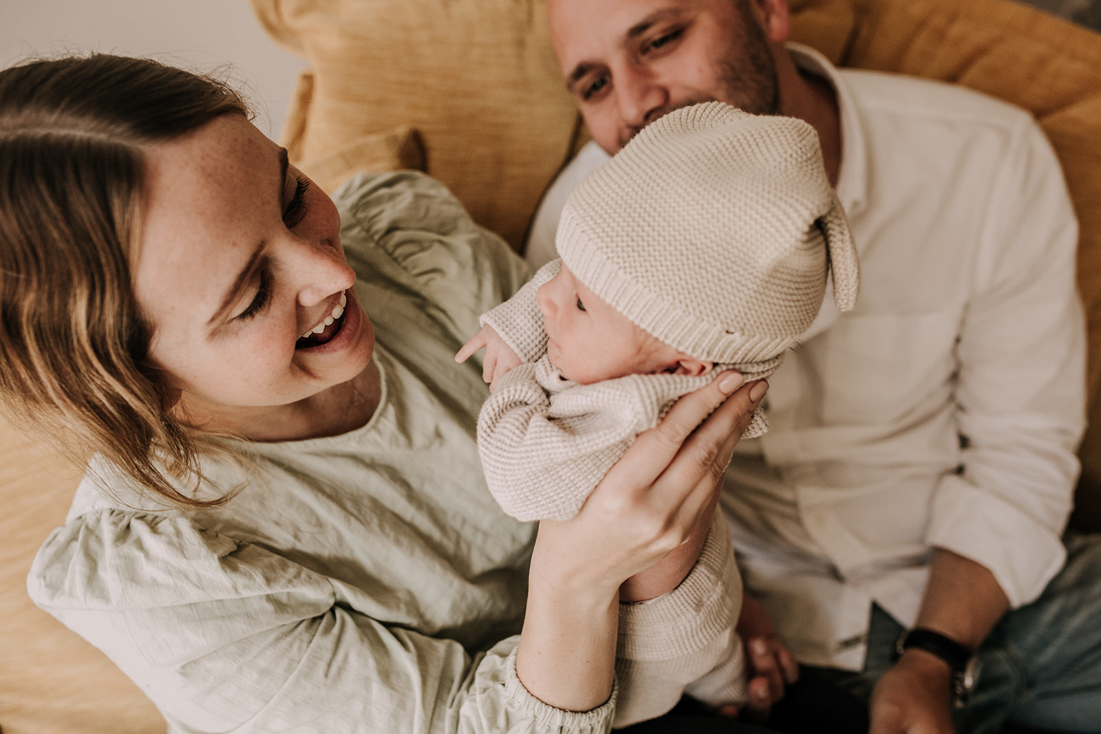 in home newborn photos newborn baby infant family photos in home family session San Diego family photographer Sabrina Kinsella