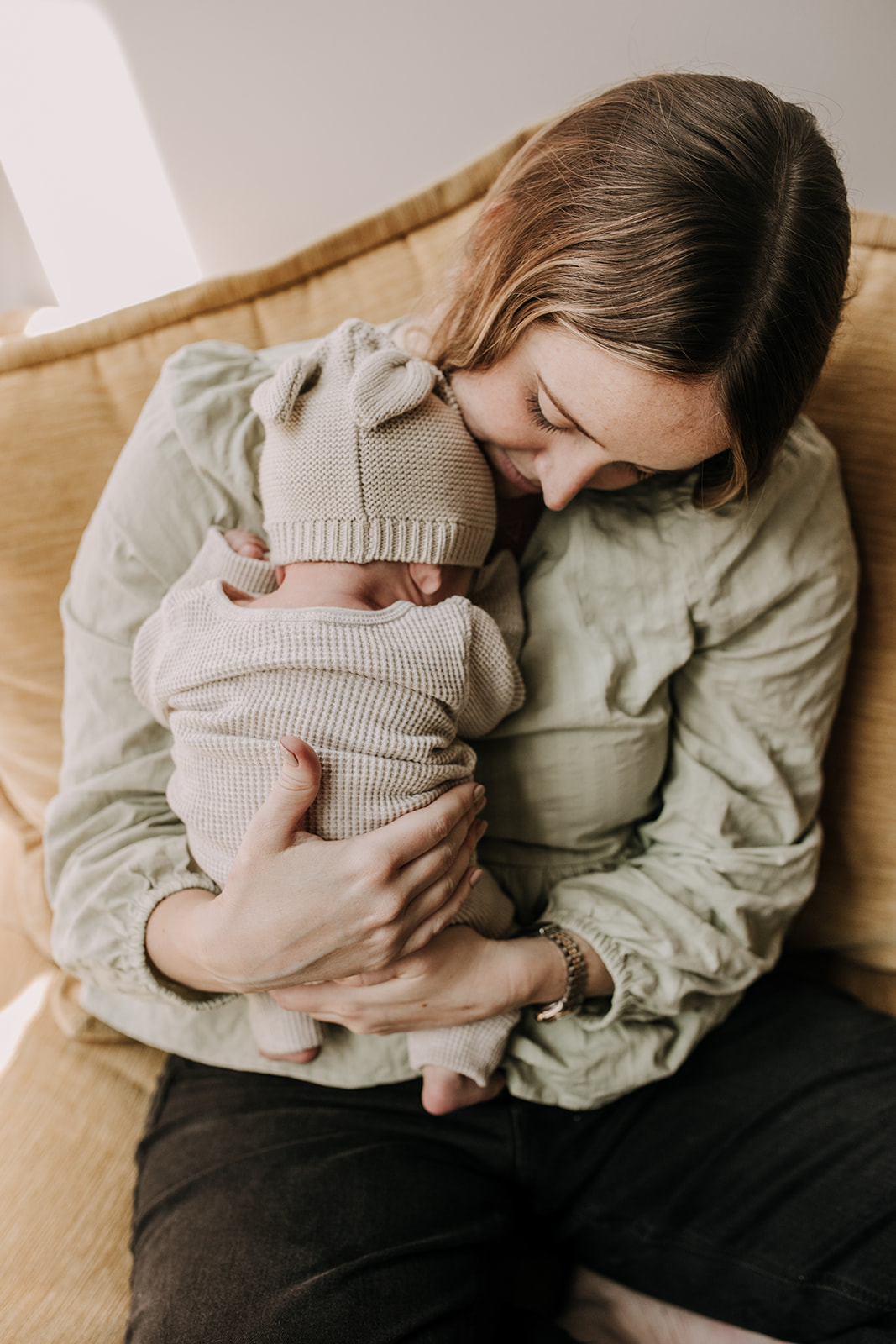 in home newborn photos newborn baby infant family photos in home family session San Diego family photographer Sabrina Kinsella