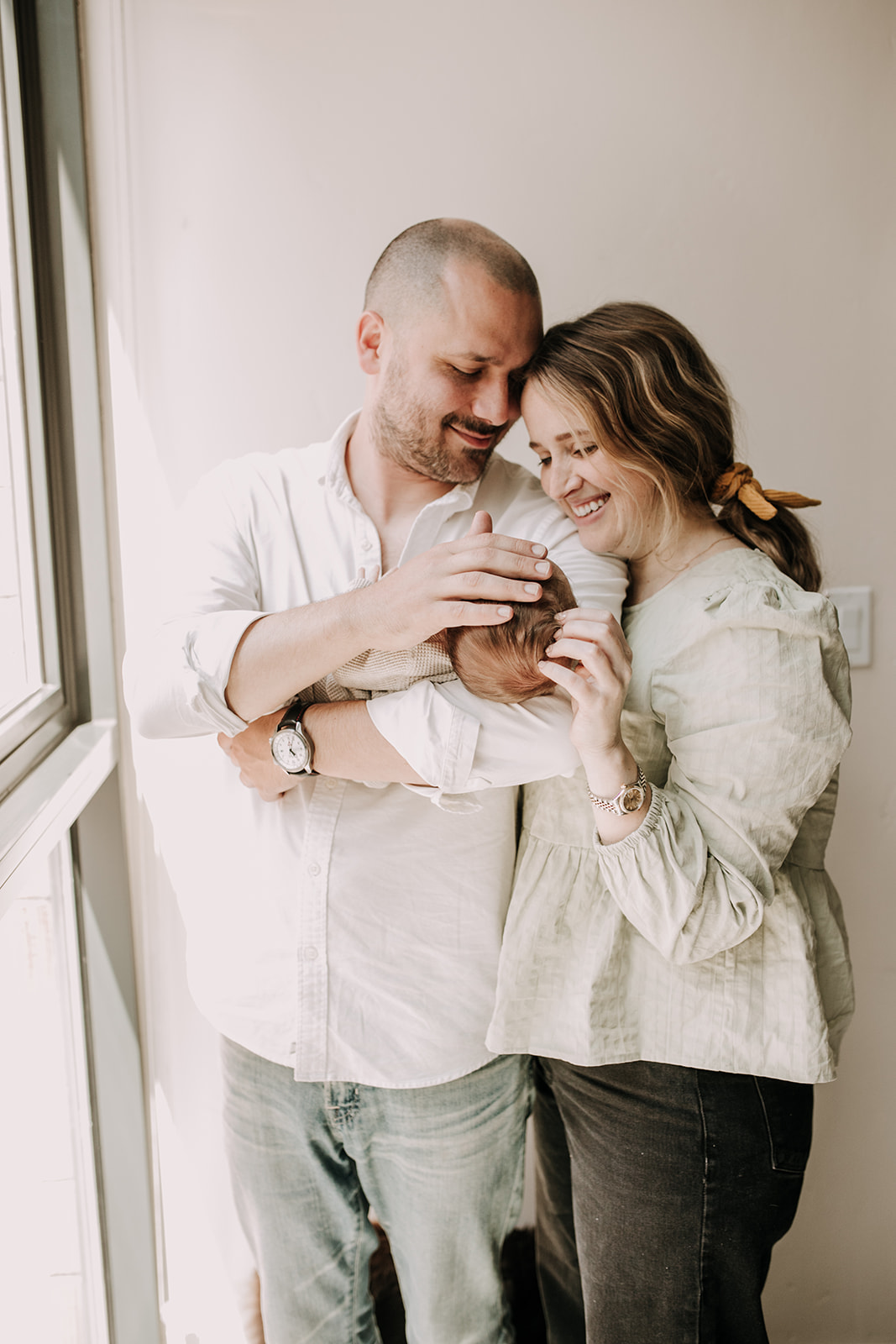 in home newborn photos newborn baby infant family photos in home family session San Diego family photographer Sabrina Kinsella