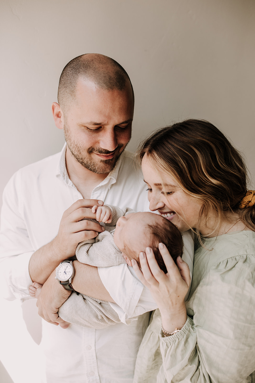 in home newborn photos newborn baby infant family photos in home family session San Diego family photographer Sabrina Kinsella