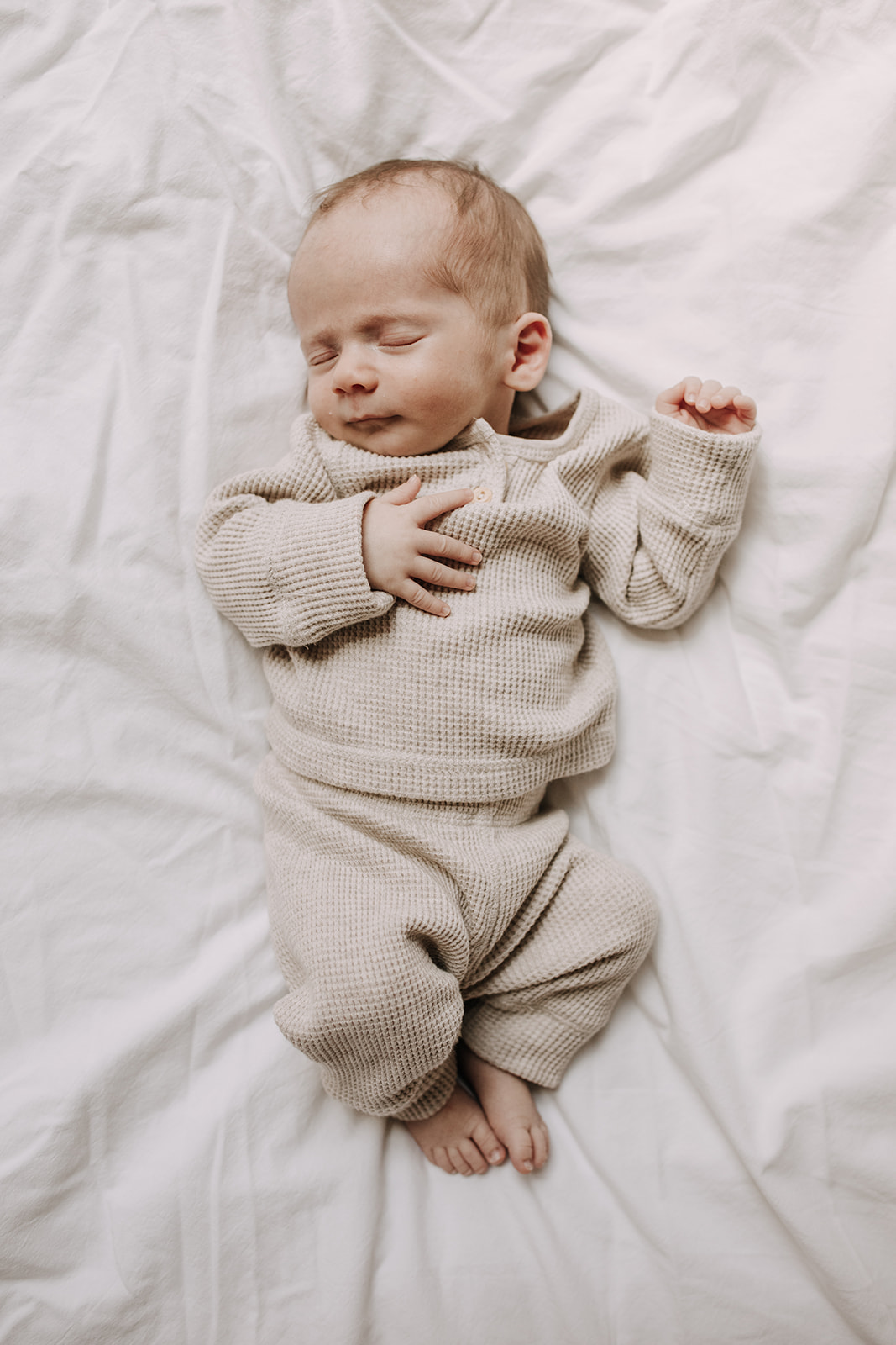 in home newborn photos newborn baby infant family photos in home family session San Diego family photographer Sabrina Kinsella