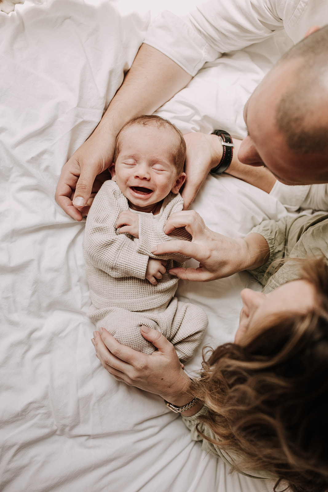 in home newborn photos newborn baby infant family photos in home family session San Diego family photographer Sabrina Kinsella