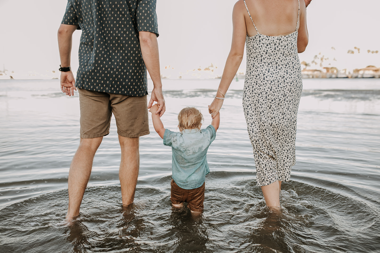 outdoor family session beach session in the water family photos summer photos family photo inspo San Diego family photographer Sabrina Kinsella sabrinalynnphoto