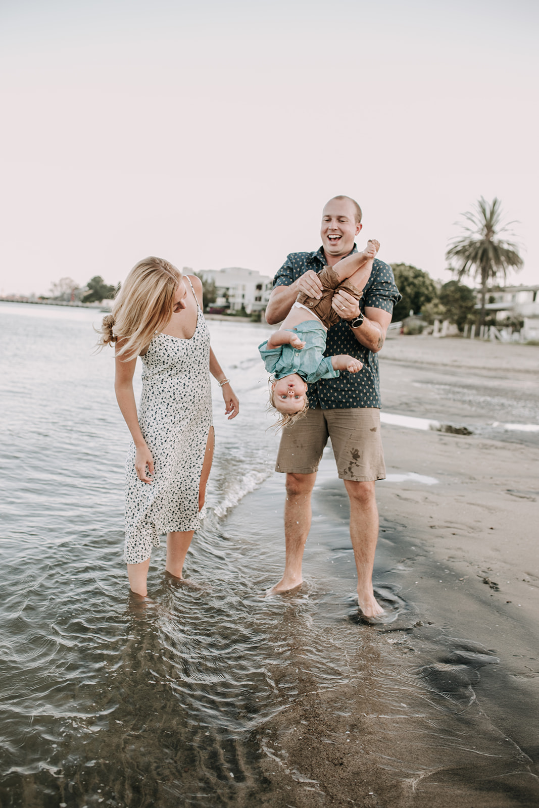 outdoor family session beach session in the water family photos summer photos family photo inspo San Diego family photographer Sabrina Kinsella sabrinalynnphoto