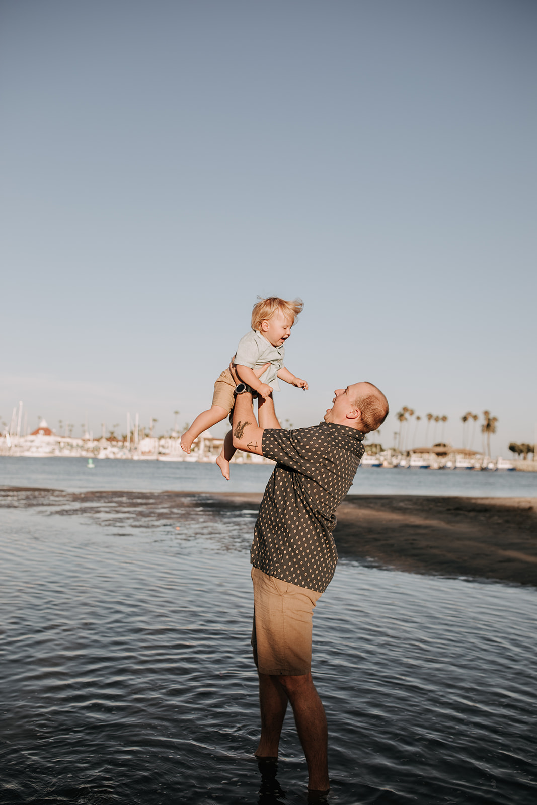 outdoor family session beach session in the water family photos summer photos family photo inspo San Diego family photographer Sabrina Kinsella sabrinalynnphoto