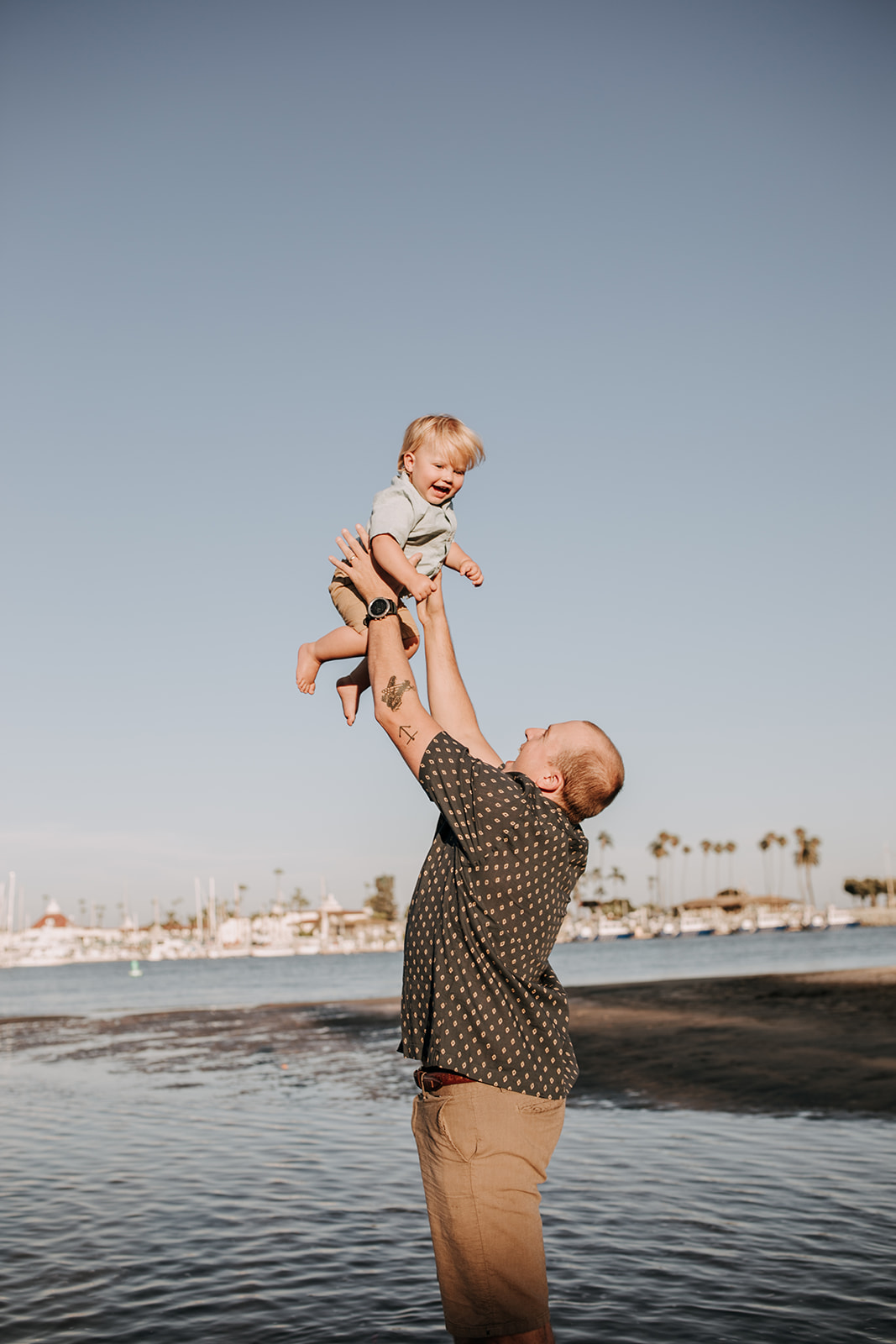 outdoor family session beach session in the water family photos summer photos family photo inspo San Diego family photographer Sabrina Kinsella sabrinalynnphoto