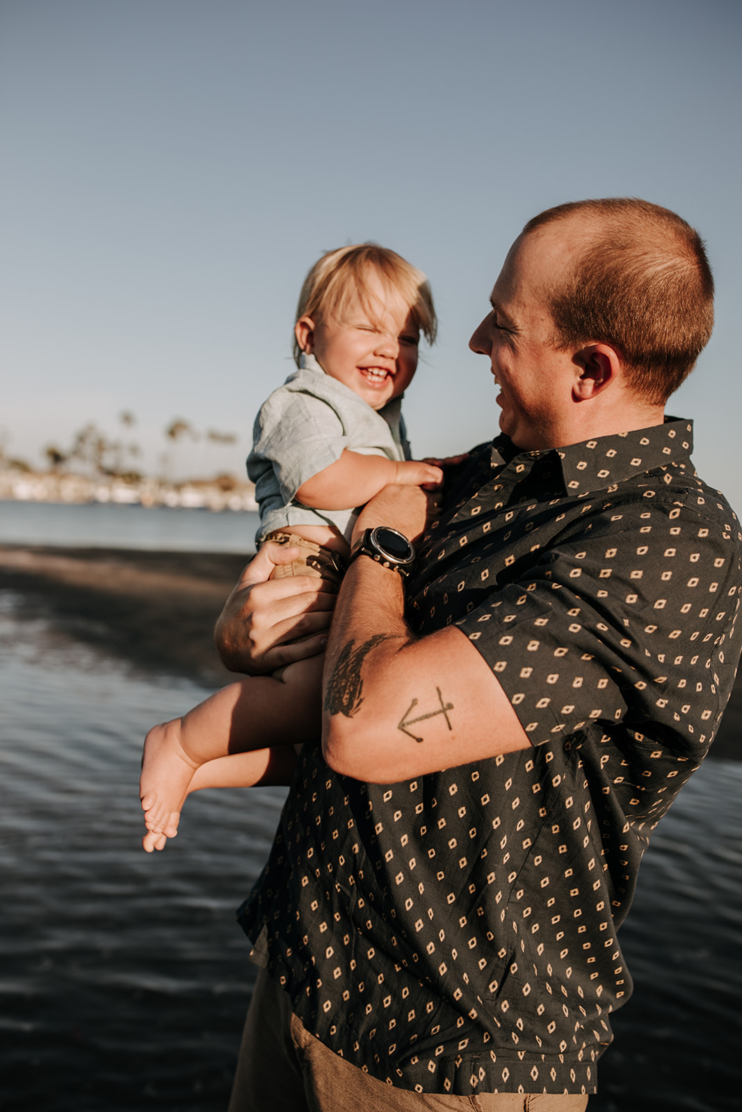 outdoor family session beach session in the water family photos summer photos family photo inspo San Diego family photographer Sabrina Kinsella sabrinalynnphoto