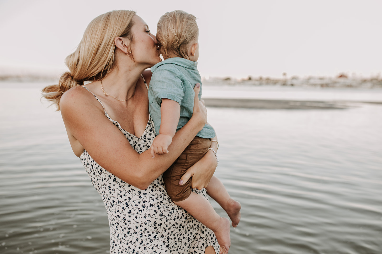 outdoor family session beach session in the water family photos summer photos family photo inspo San Diego family photographer Sabrina Kinsella sabrinalynnphoto