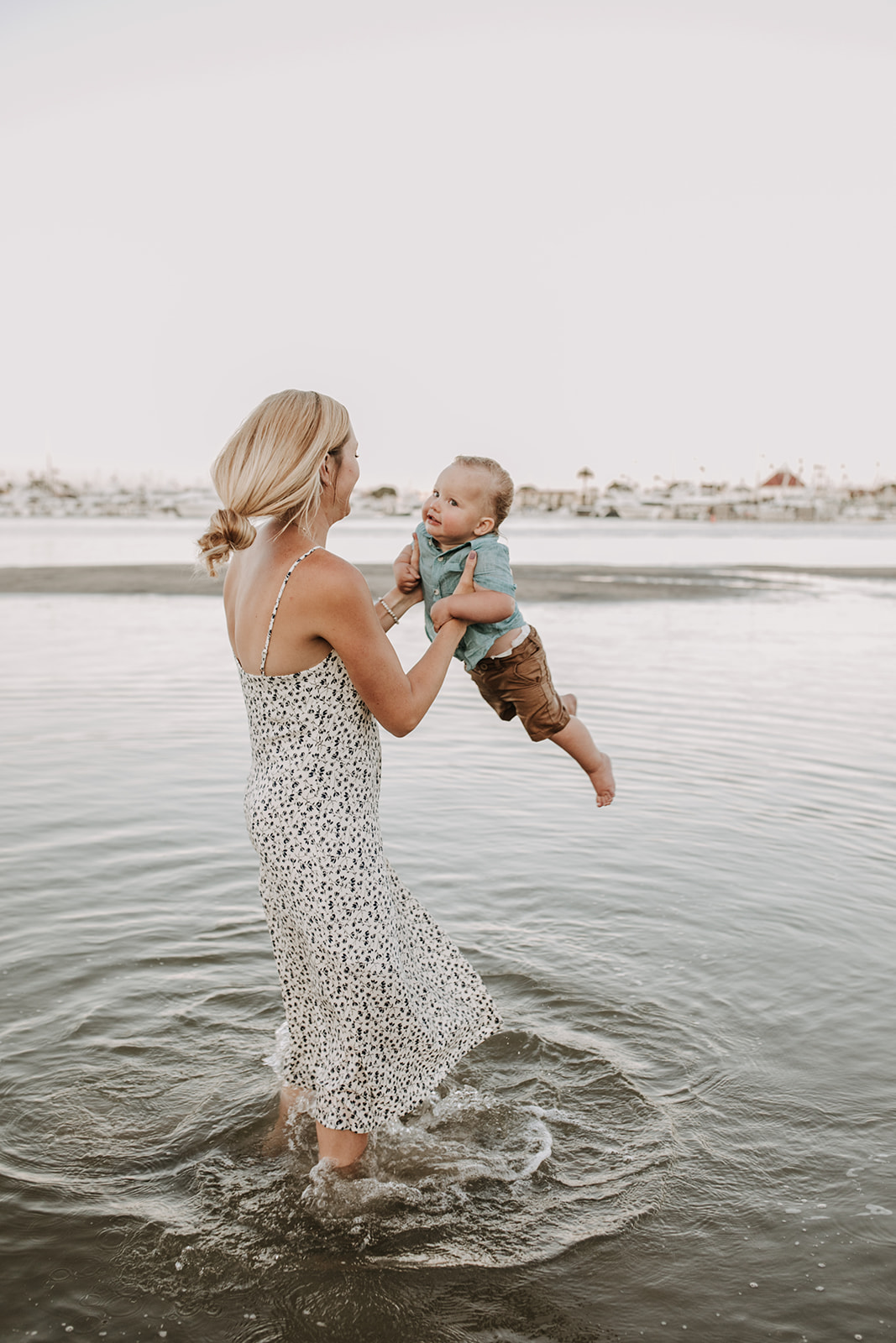 outdoor family session beach session in the water family photos summer photos family photo inspo San Diego family photographer Sabrina Kinsella sabrinalynnphoto