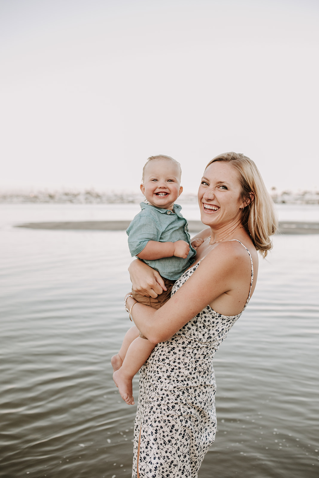 outdoor family session beach session in the water family photos summer photos family photo inspo San Diego family photographer Sabrina Kinsella sabrinalynnphoto