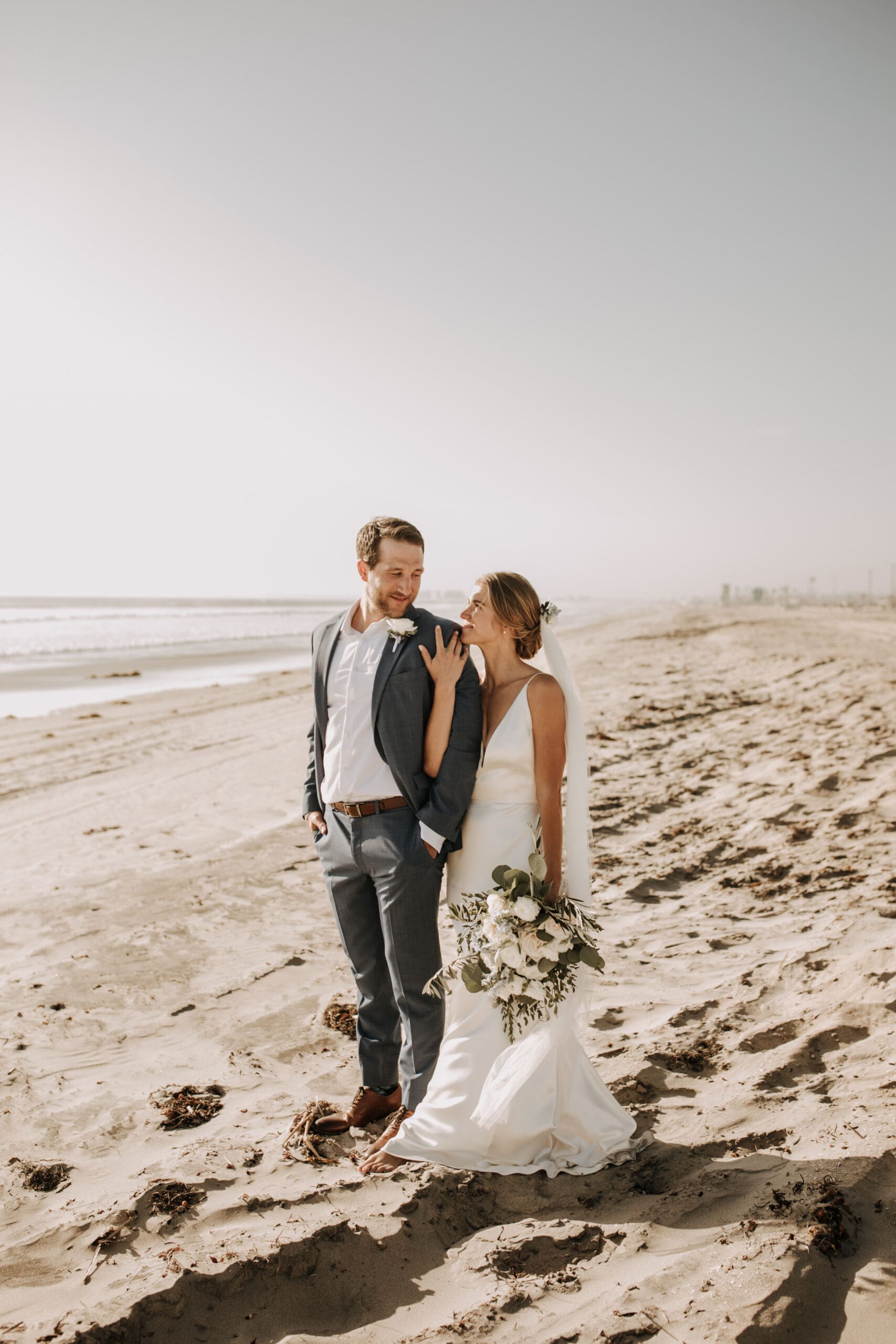 beach wedding Coronado cays outdoor beach wedding wedding dress wedding florals wedding party bride and groom marriage San Diego wedding photographer Sabrina kinsella Sabrina kinsella