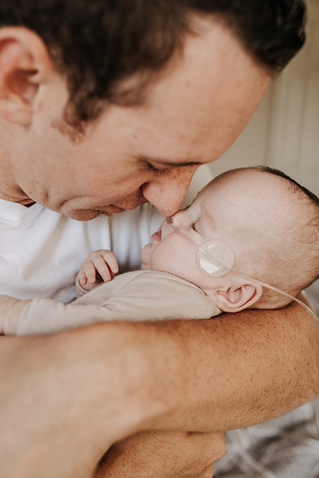 in home newborn photography photoshoot in home warm cozy family session San Diego photographer Sabrina Kinsella sabrinalynnphoto