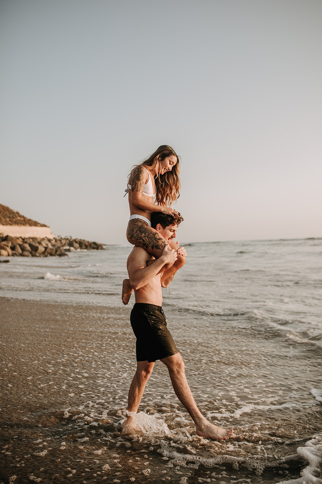 beach San Diego sunset golden hour beach couples photoshoot couples session San Diego couples photographer Sabrina Kinsella