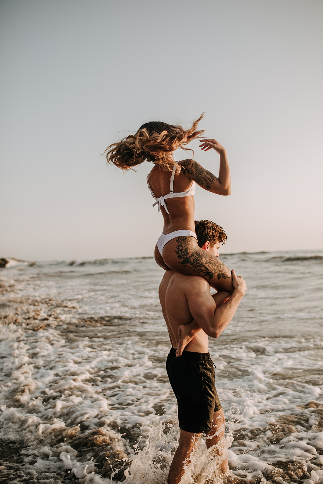 beach San Diego sunset golden hour beach couples photoshoot couples session San Diego couples photographer Sabrina Kinsella