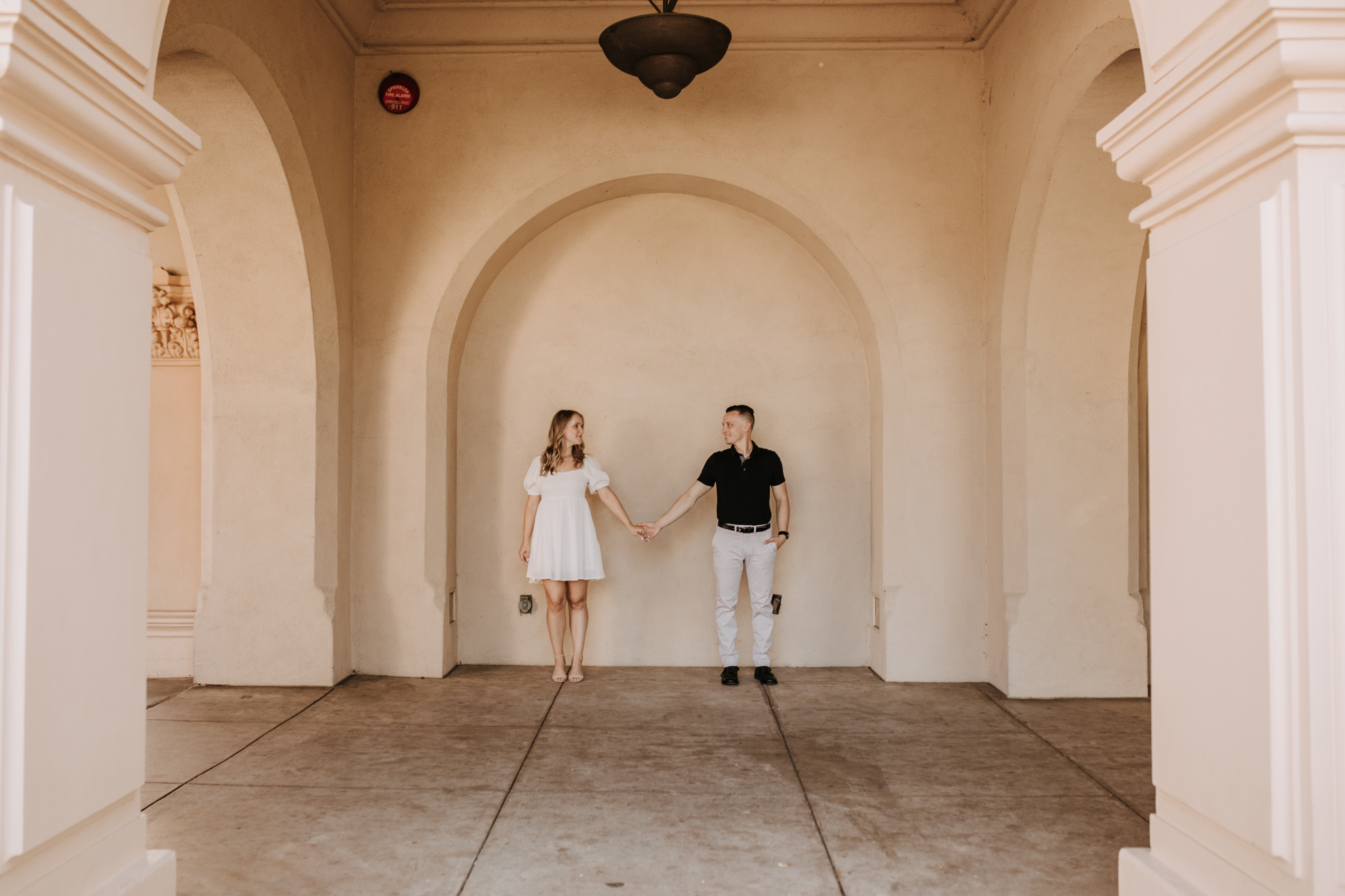 couples phots couple sessin engagement photos san Diego couples photographer san Diego engagement photographer San Diego wedding photographer Balboa park museum photos engagement inspo San Diego lifestyle photographer Sabrina Kinsella  love marriage engagement