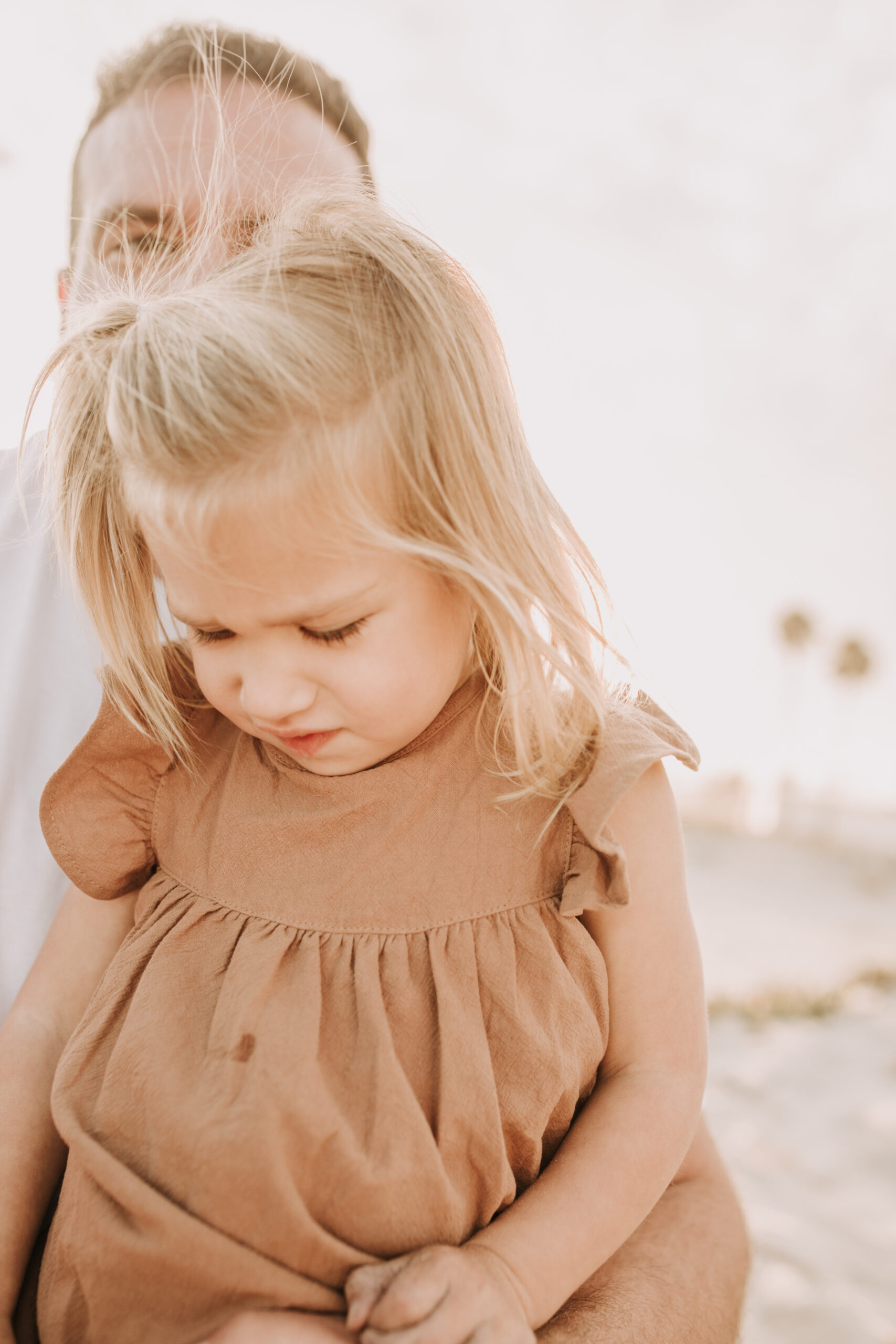 warm family beach session family p photos on the beach San Diego family photographer Sabrina kinsella