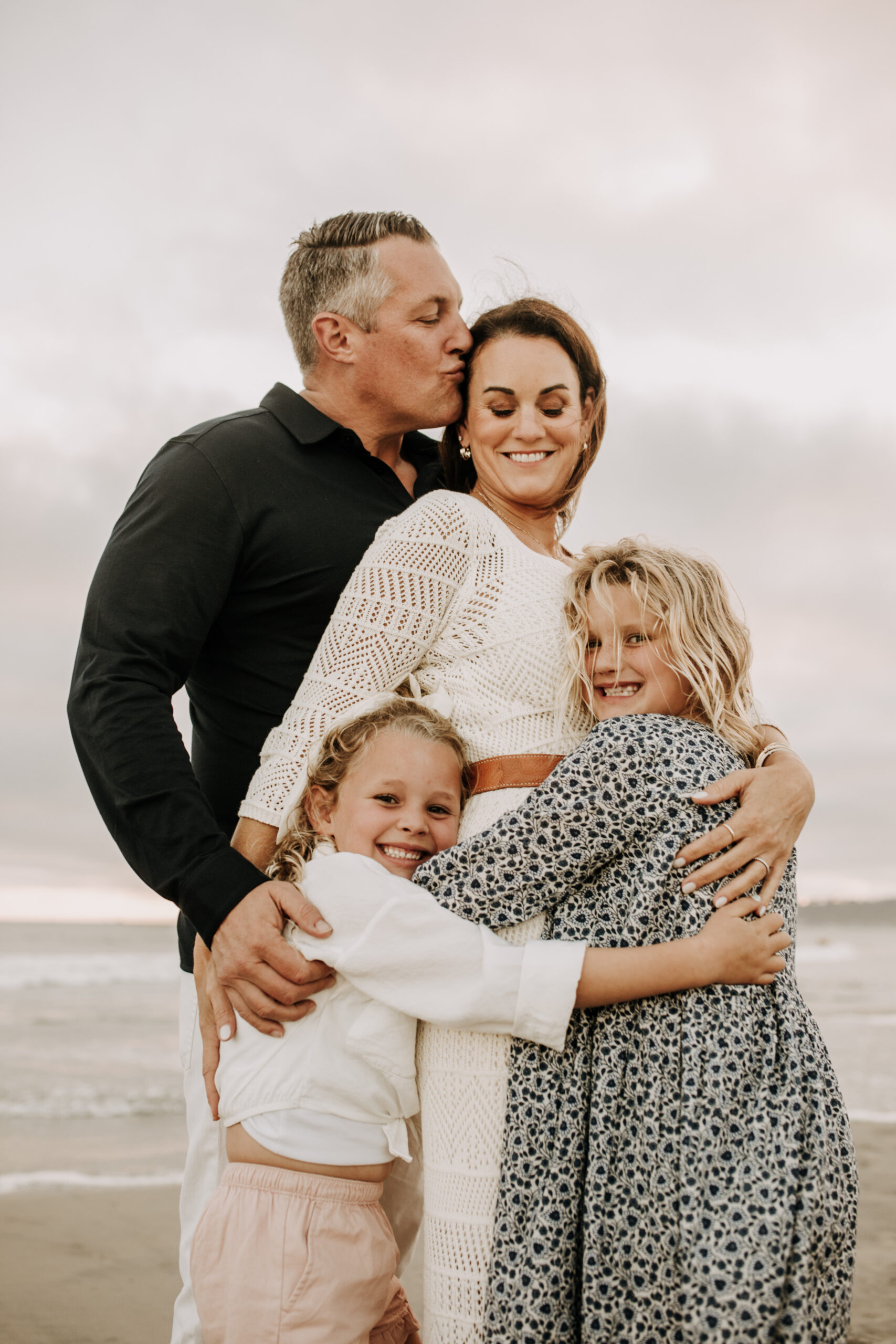 cool toned family photoshoot beach photos family photos on the beach cloudy vibes San Diego family photographer lifestyle photographer beach photoshoot inspo