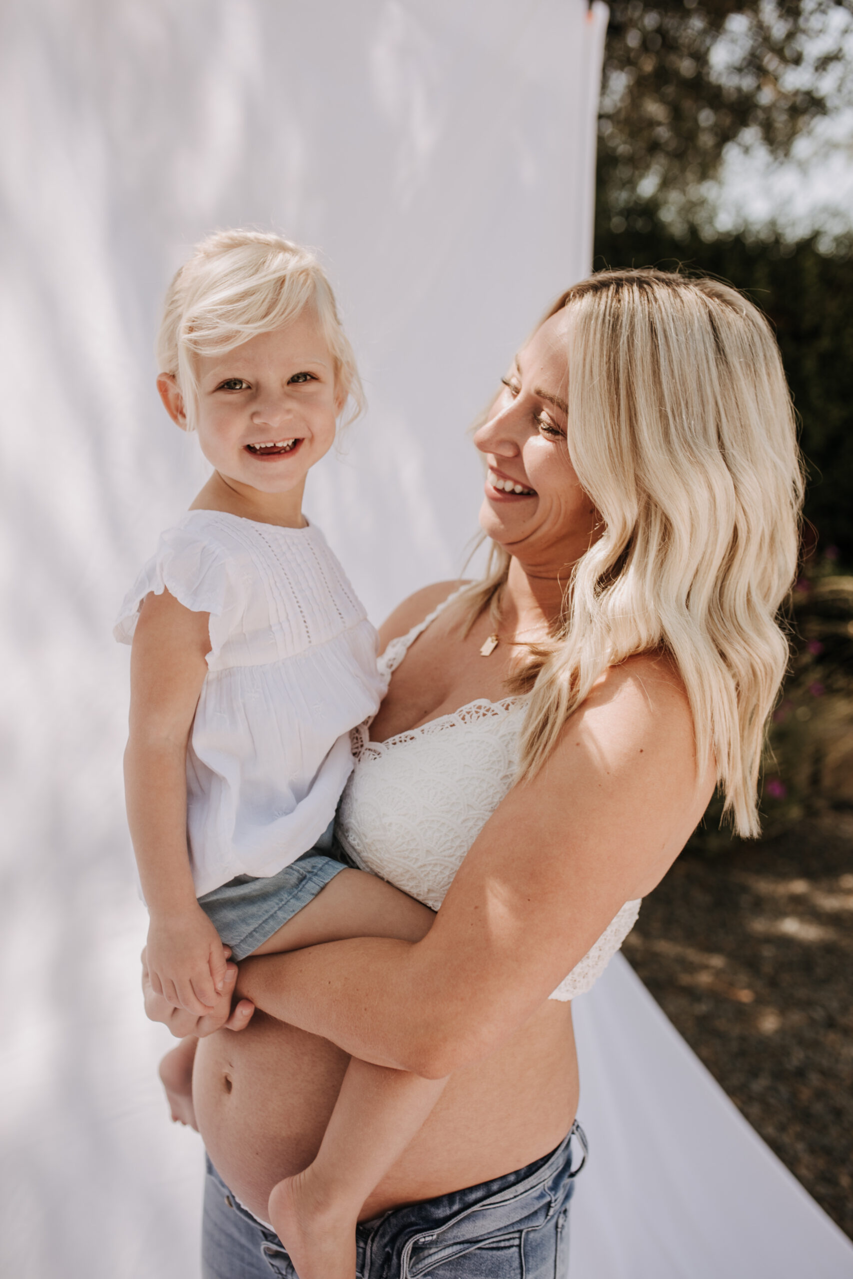 maternity pregnancy motherhood mama and me mom and daughter backyard mini session maternity photos family photos outdoor maternity San Diego family photographer Sabrina Kinsella sabrinalynnphotos love candid