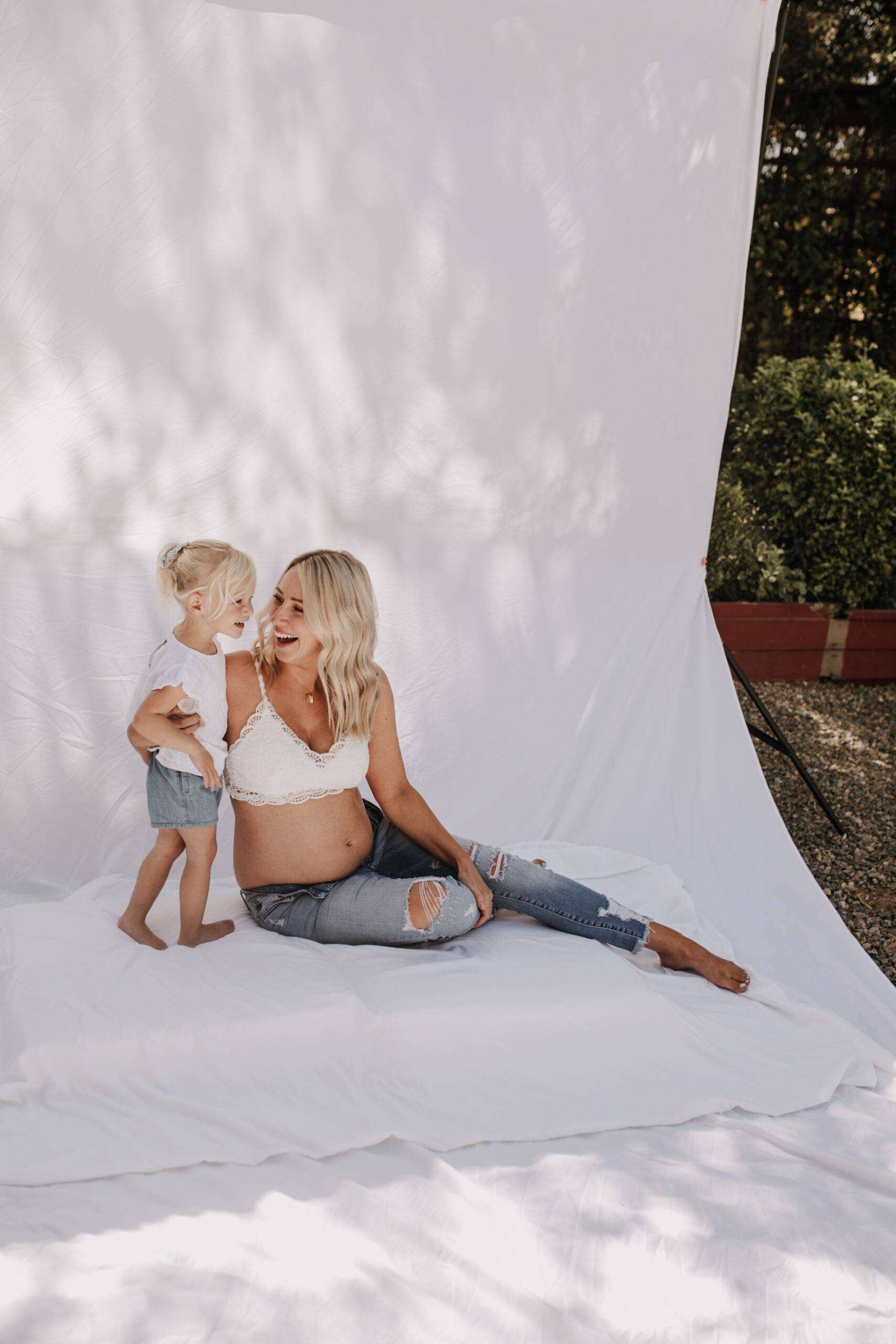 maternity pregnancy motherhood mama and me mom and daughter backyard mini session maternity photos family photos outdoor maternity San Diego family photographer Sabrina Kinsella sabrinalynnphotos love candid