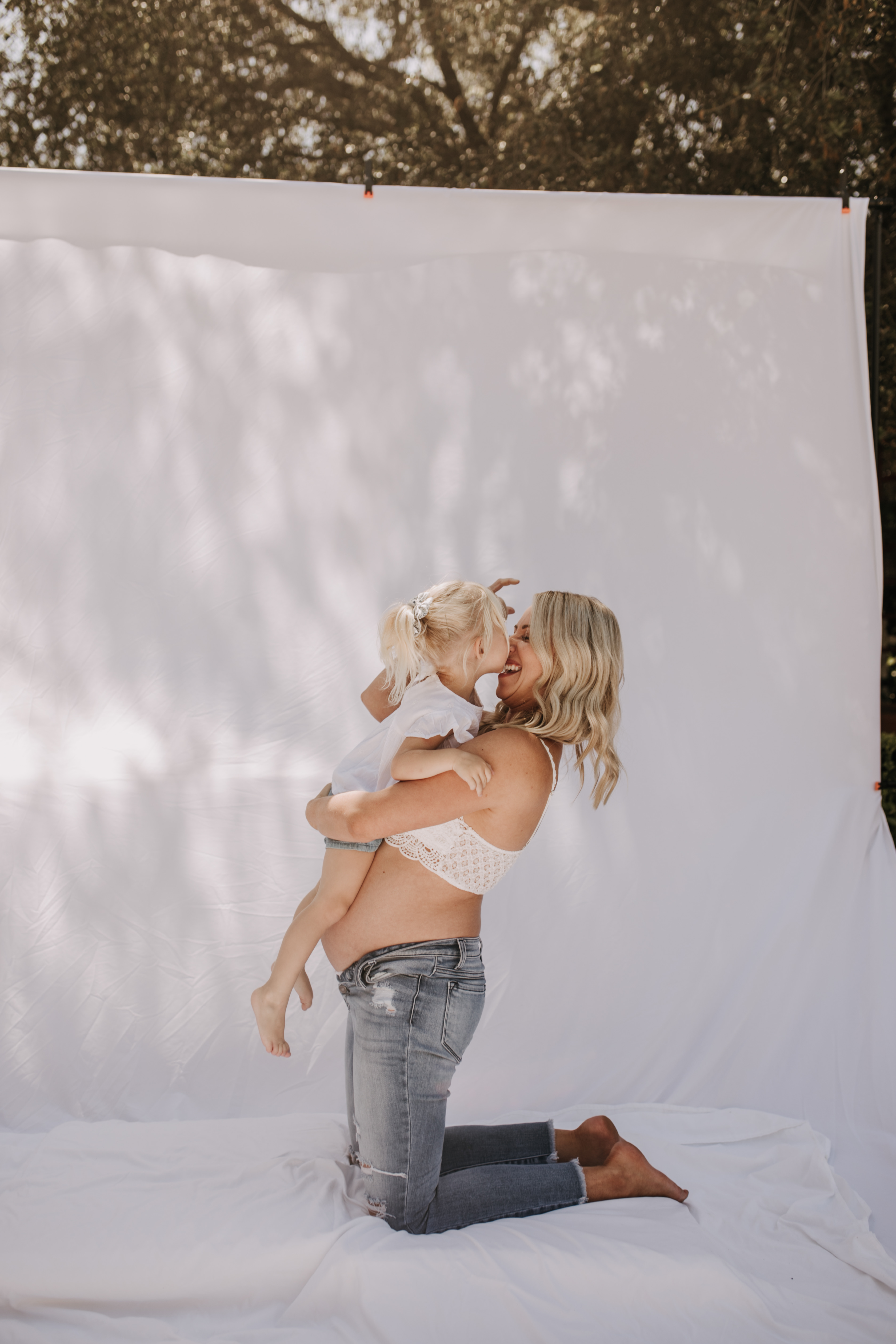 maternity pregnancy motherhood mama and me mom and daughter backyard mini session maternity photos family photos outdoor maternity San Diego family photographer Sabrina Kinsella sabrinalynnphotos love candid