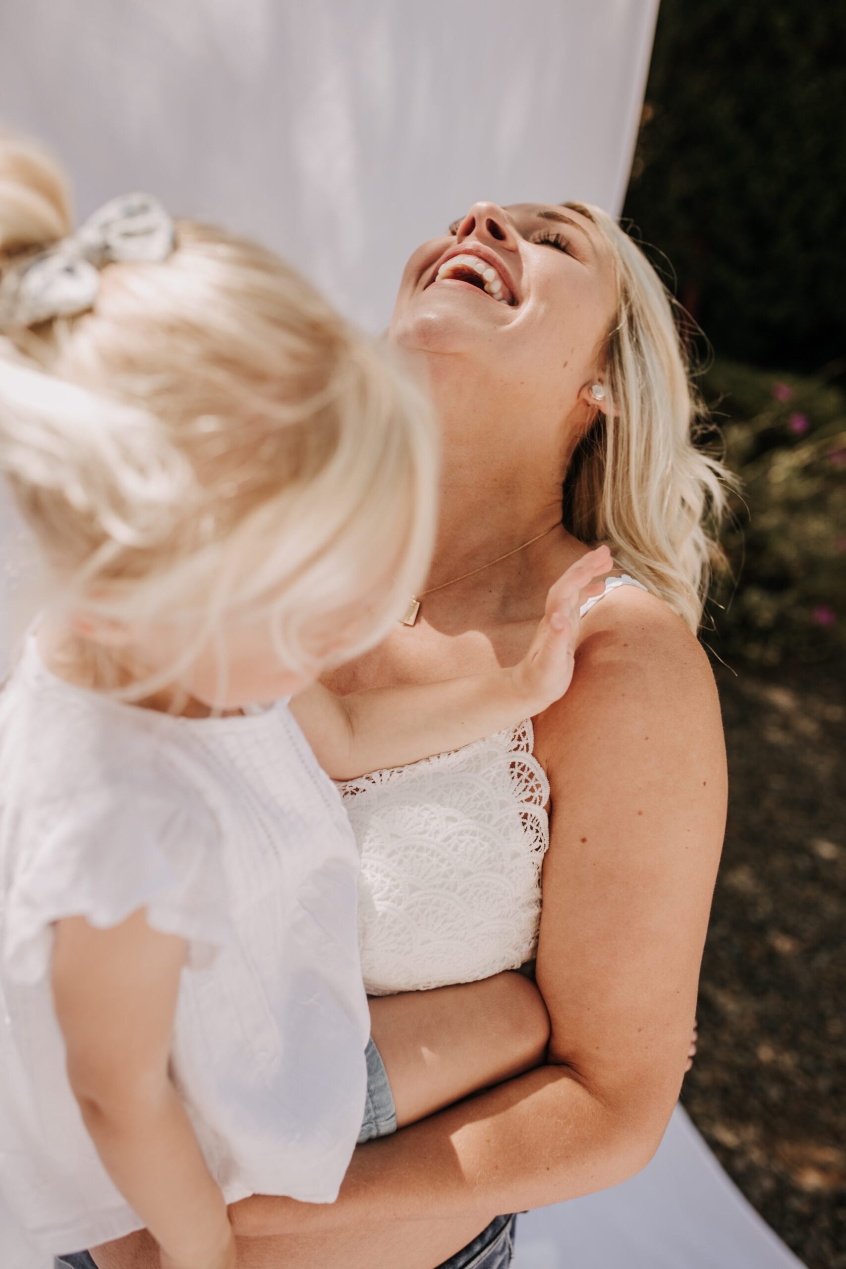 maternity pregnancy motherhood mama and me mom and daughter backyard mini session maternity photos family photos outdoor maternity San Diego family photographer Sabrina Kinsella sabrinalynnphotos love candid