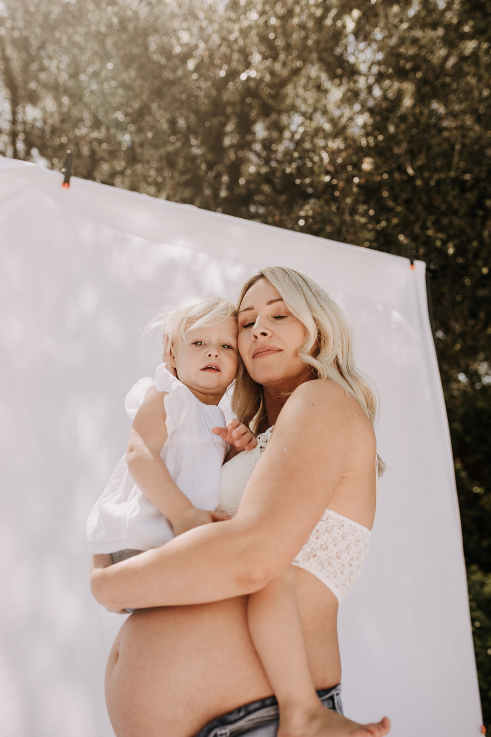 maternity pregnancy motherhood mama and me mom and daughter backyard mini session maternity photos family photos outdoor maternity San Diego family photographer Sabrina Kinsella sabrinalynnphotos love candid