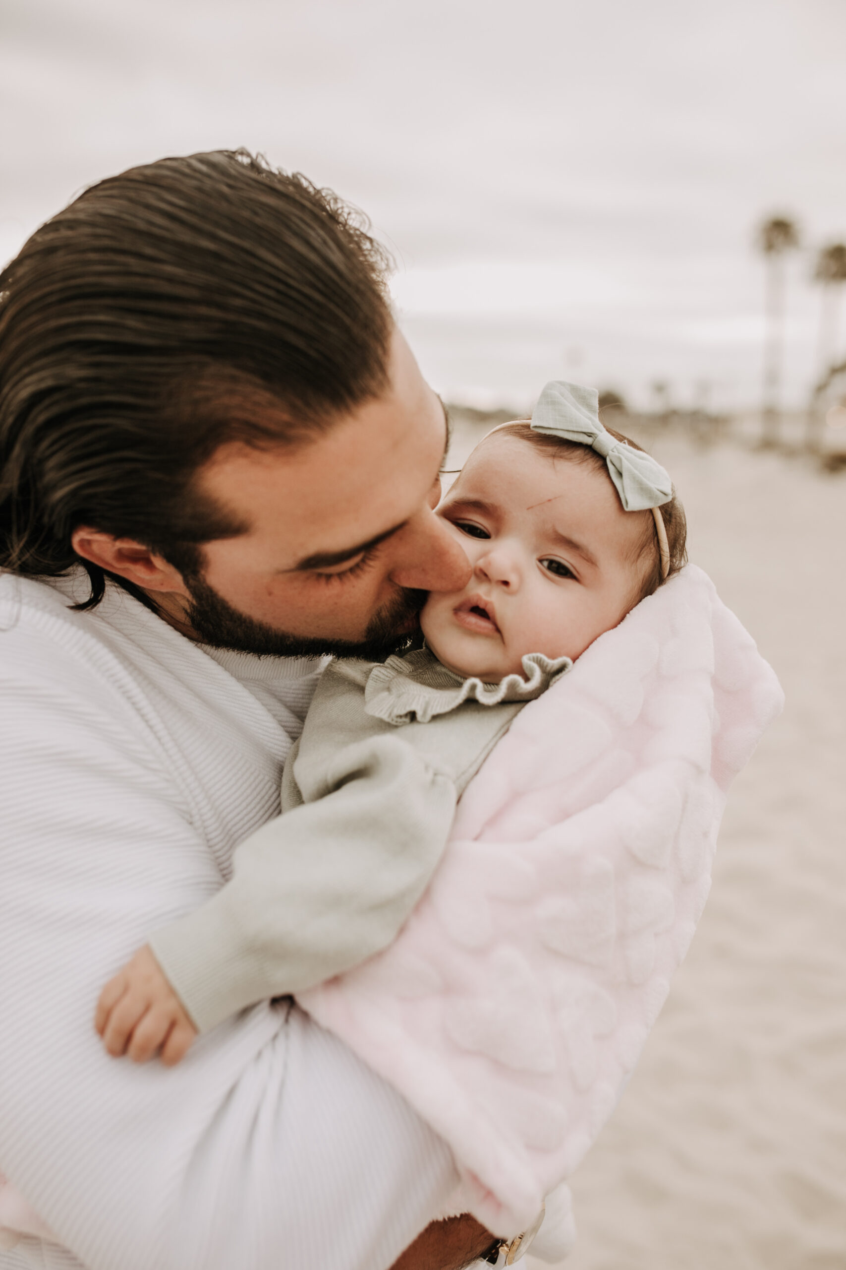 family beach session family photos on beach cloudy day beach family photoshoot San Diego family photographer Sabrina kinsella abrinalynnphoto