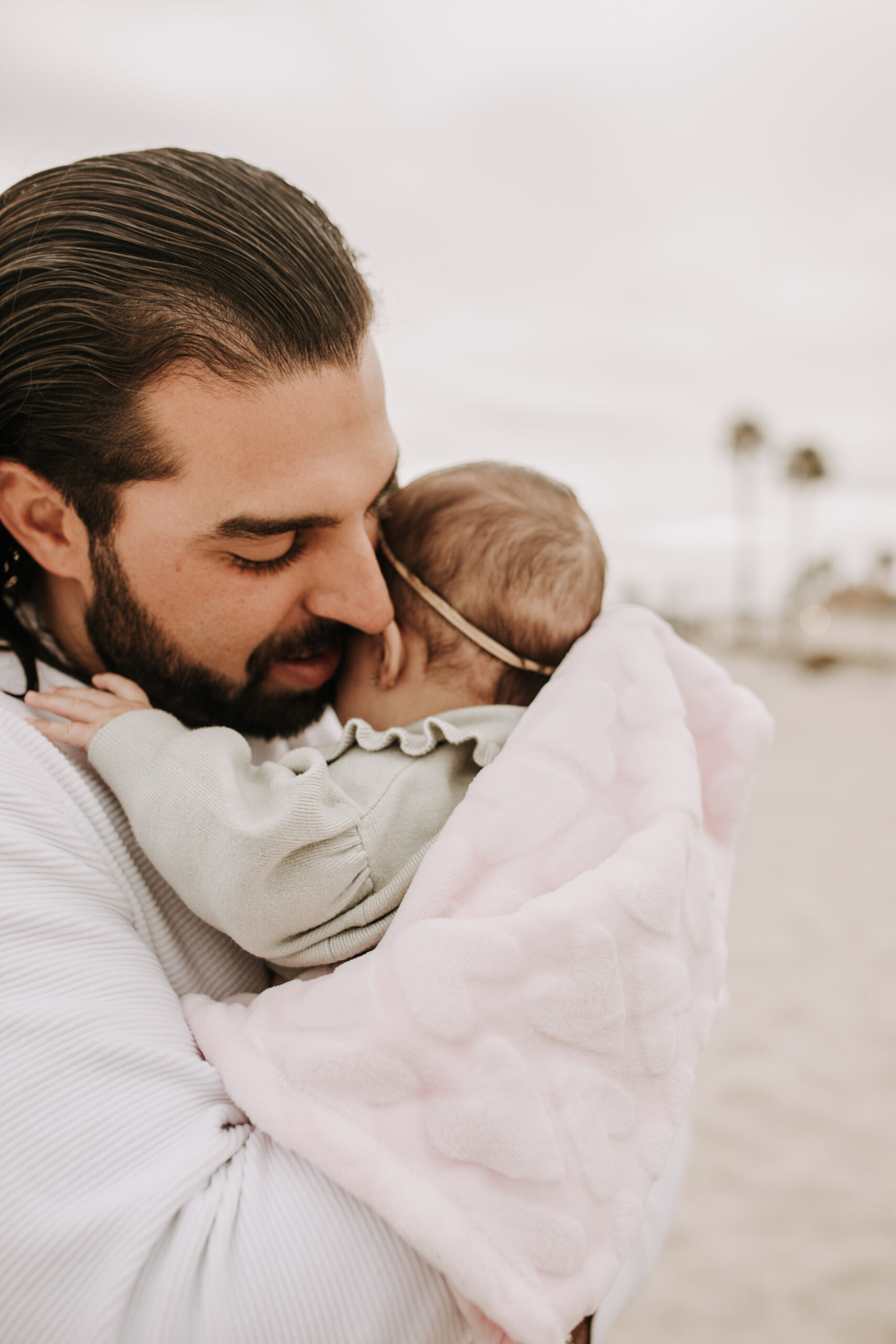 family beach session family photos on beach cloudy day beach family photoshoot San Diego family photographer Sabrina kinsella abrinalynnphoto