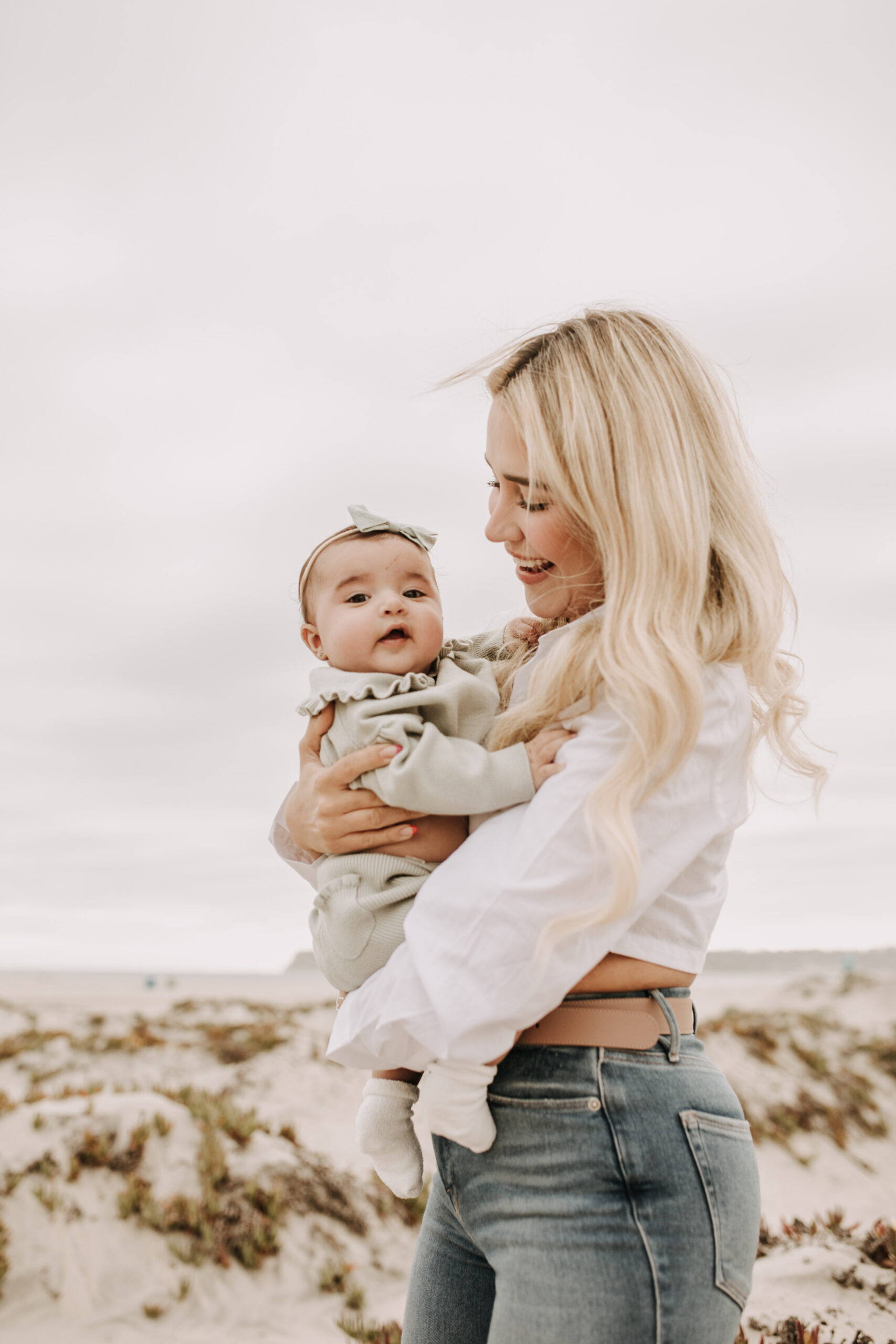 family beach session family photos on beach cloudy day beach family photoshoot San Diego family photographer Sabrina kinsella abrinalynnphoto