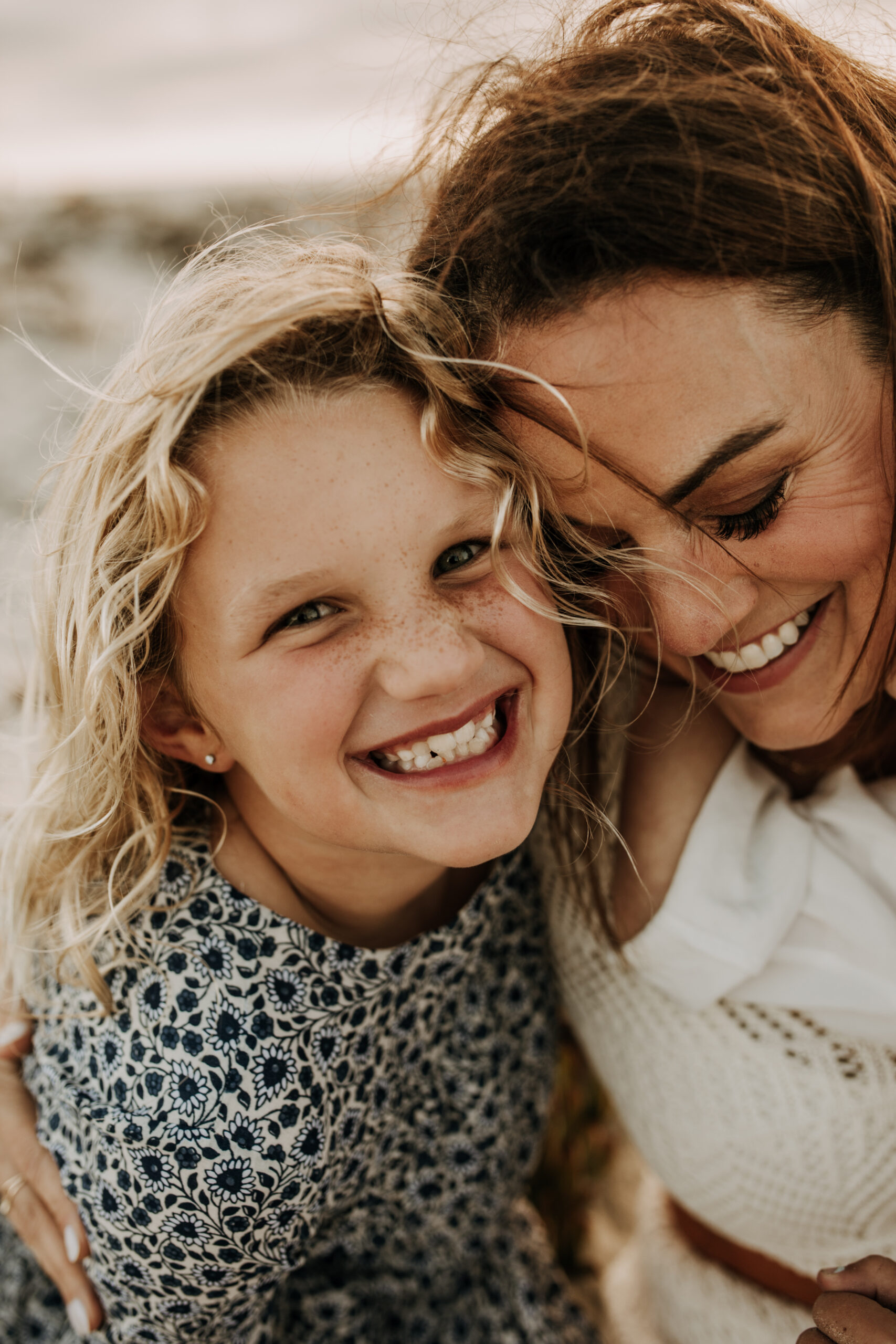 cool toned family photoshoot beach photos family photos on the beach cloudy vibes San Diego family photographer lifestyle photographer beach photoshoot inspo