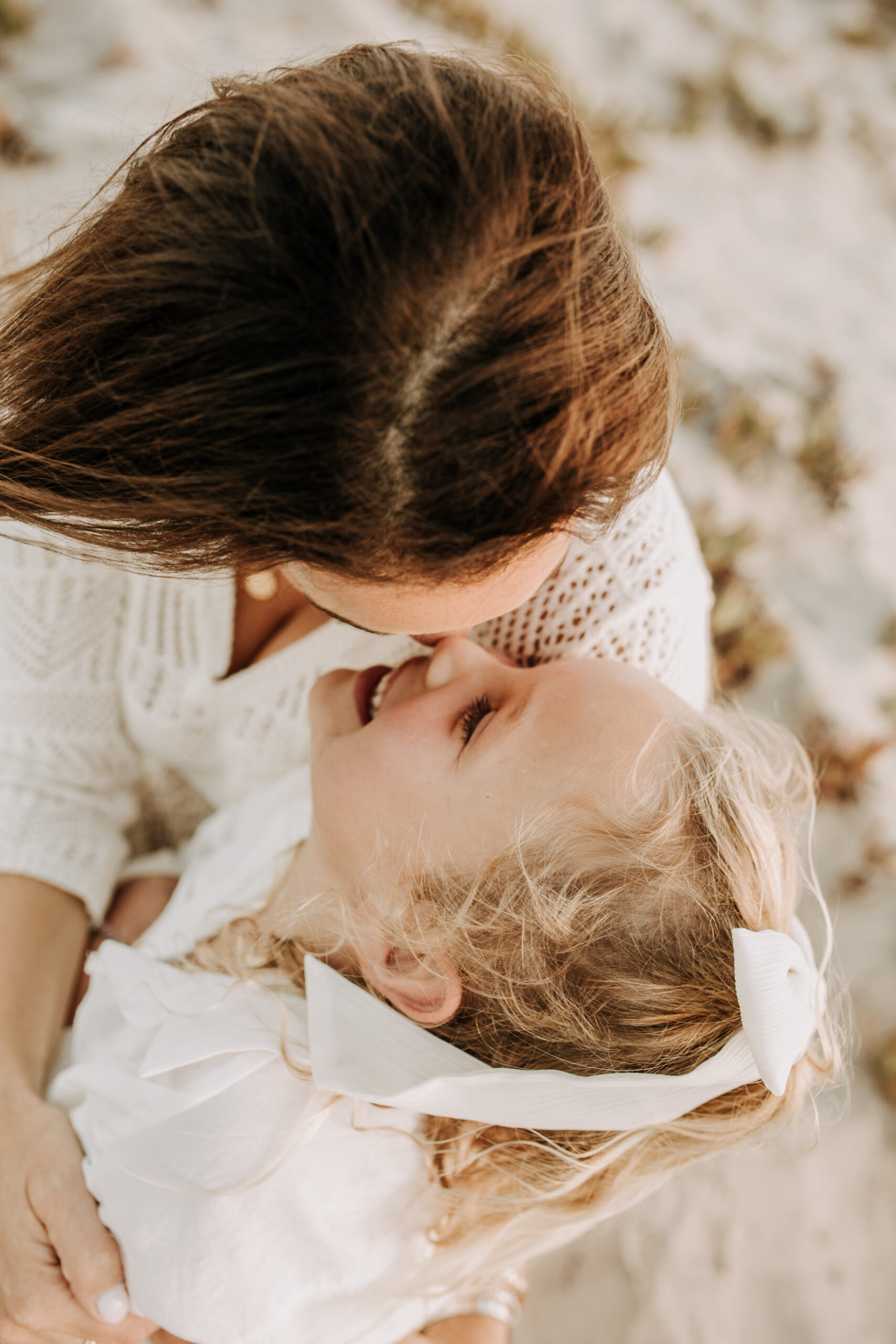 cool toned family photoshoot beach photos family photos on the beach cloudy vibes San Diego family photographer lifestyle photographer beach photoshoot inspo