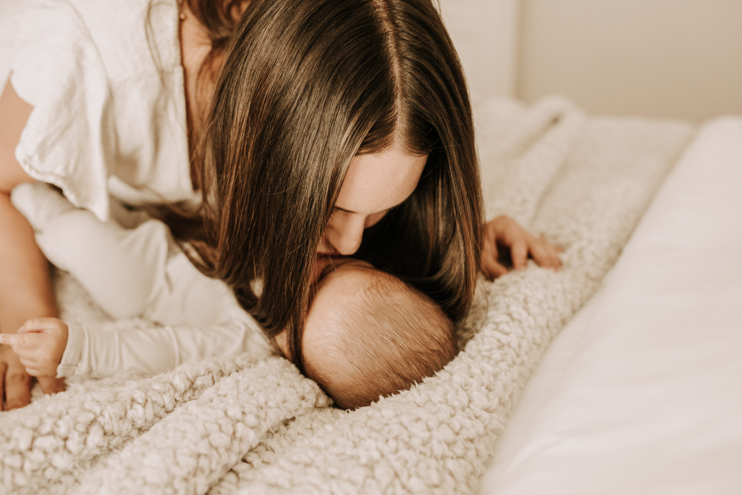 warm toned tan beige in home newborn baby photos family photos newborn baby new mom and dad San Diego family photographer Sabrina kinsella sabrinalynnphoto